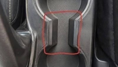 What Is the Weird Gap Between Car Cup Holders For???